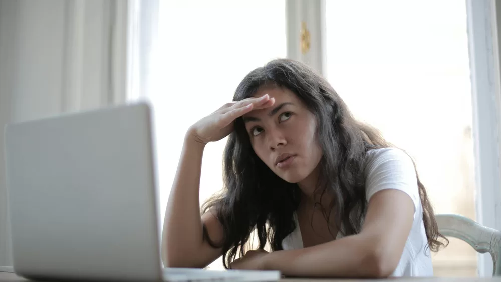 frustrated woman at laptop